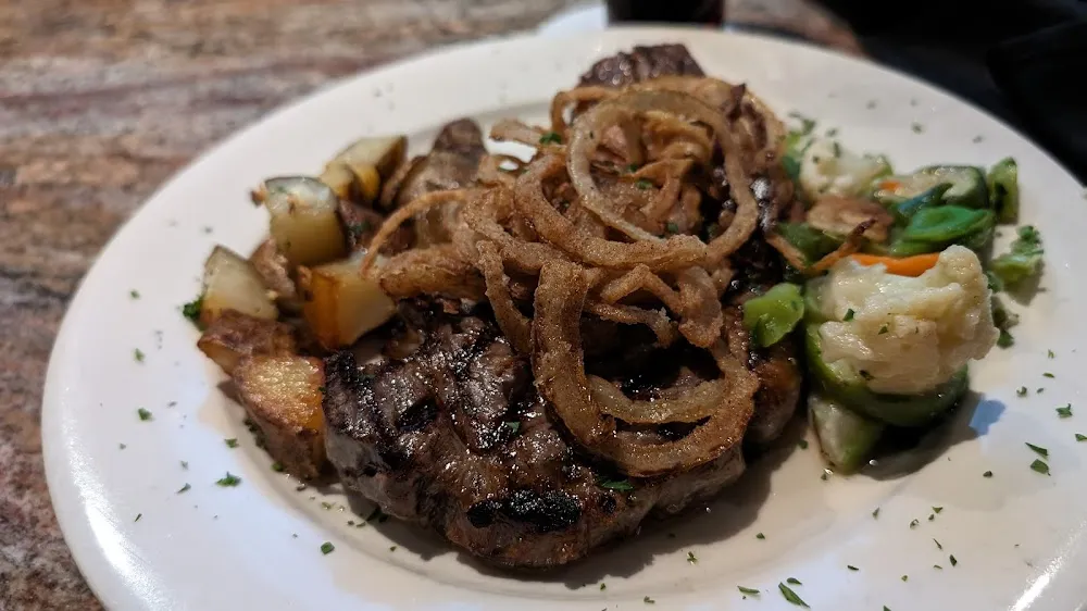 N Y Strip Steak w Frizzled Onions